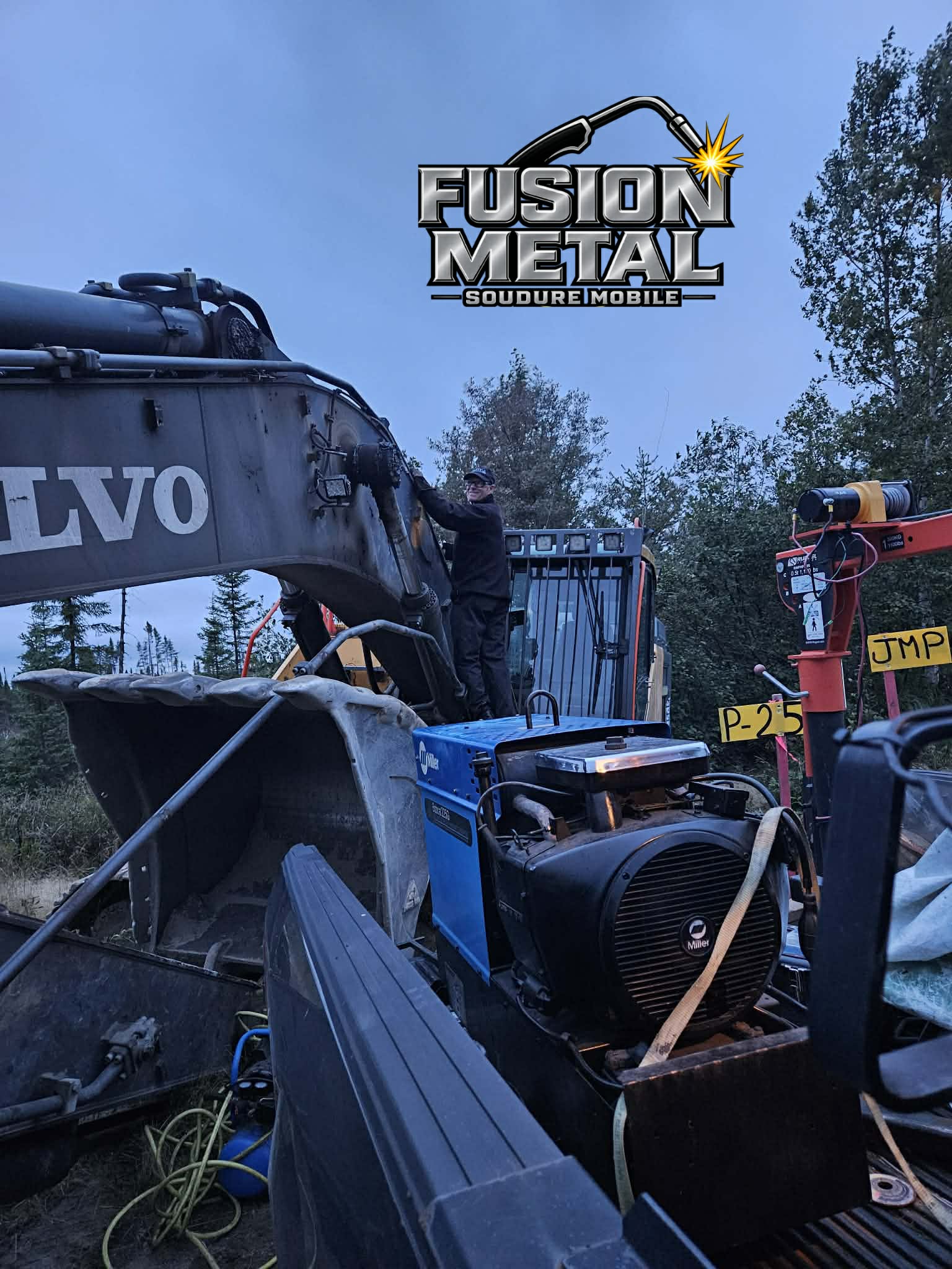 réparation métallique sur pelle volvo